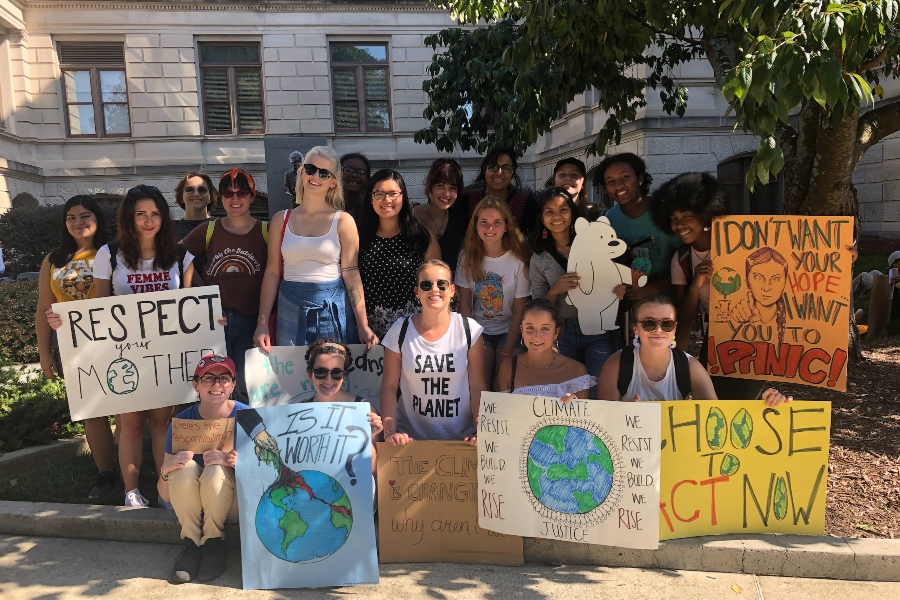 group of student volunteers focused on making Agnes Scott a green college pose for a photo.